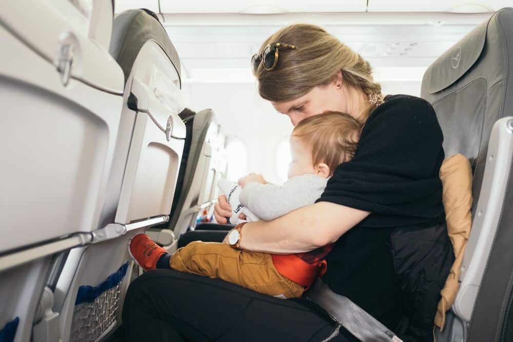 mom and child on a plane