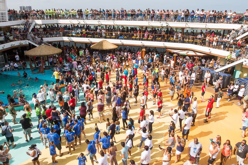 people dancing on the deck at the Sailaway party on Carnival Vista