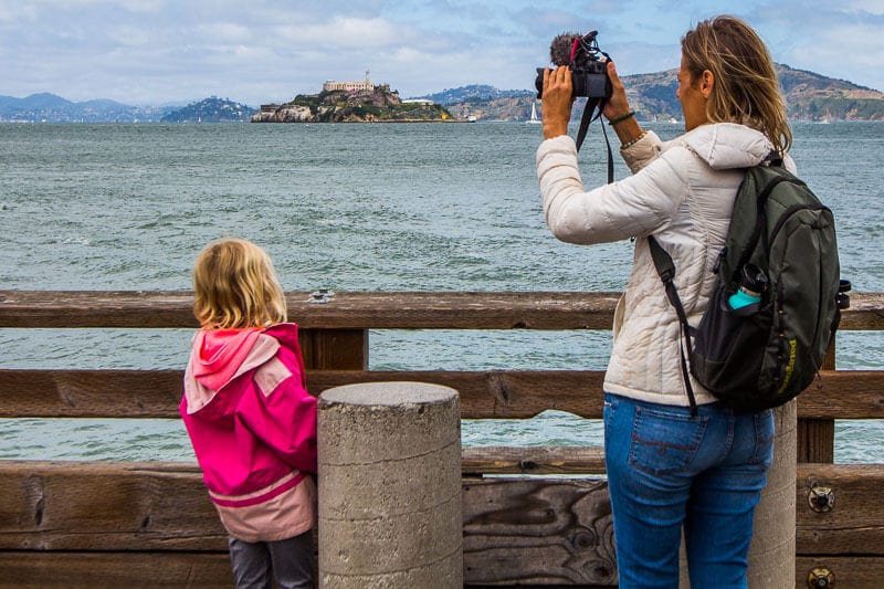 woman videoing scence of water