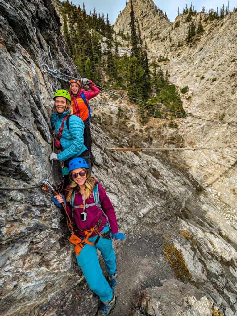 line of people on via feratta banff