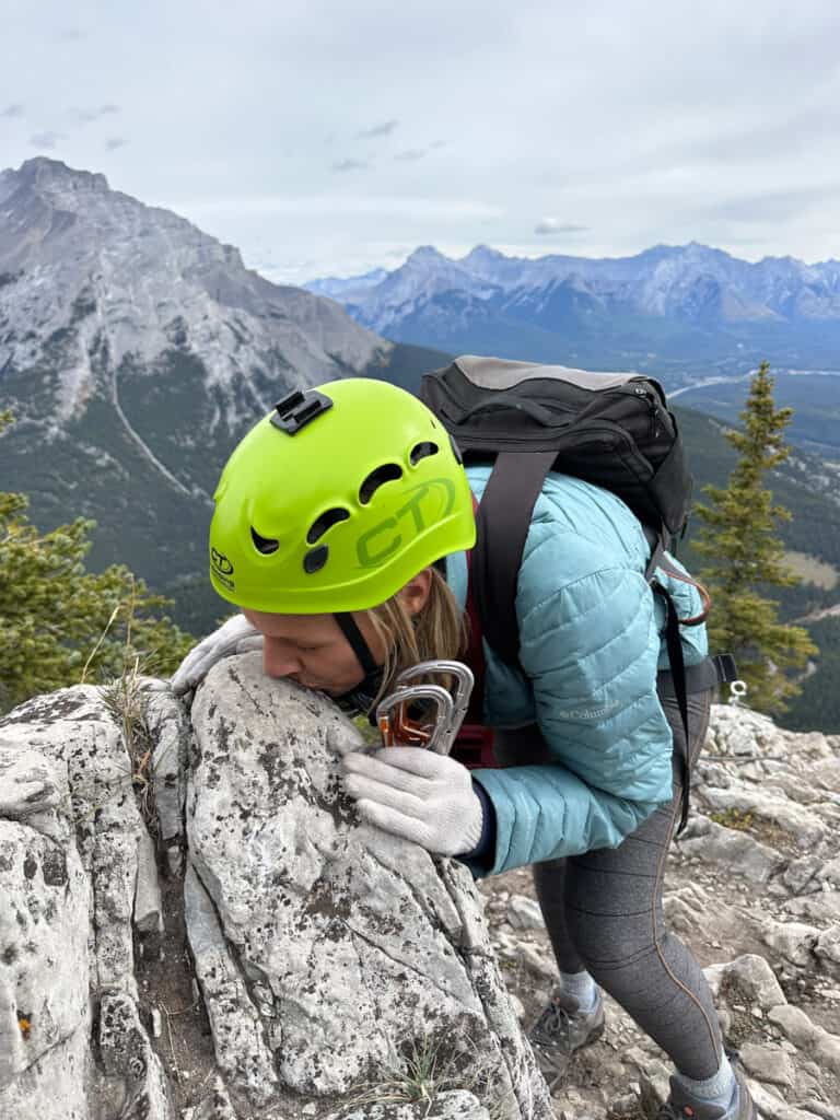 Caz kissing a rock