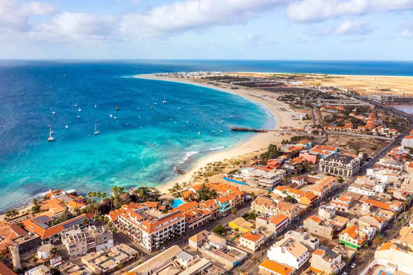 An aerial view of a beach and town.