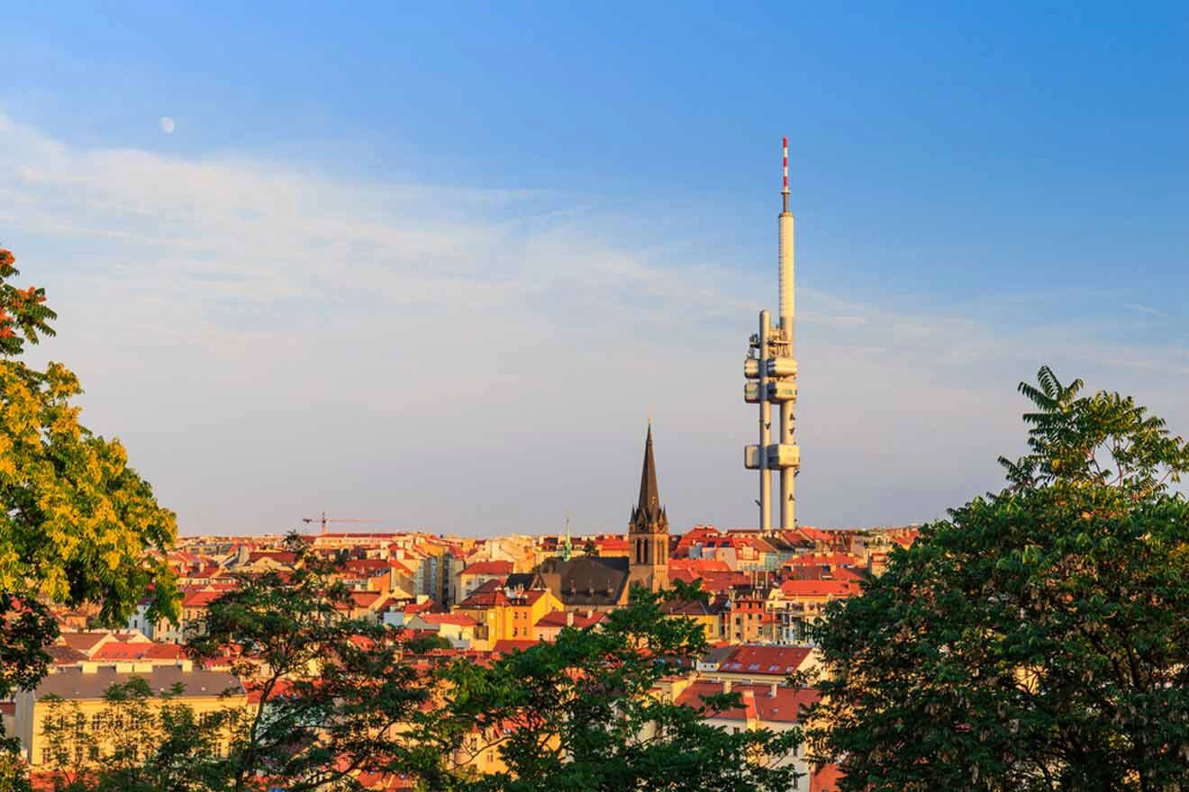 A view of a city with a tv tower in the background.