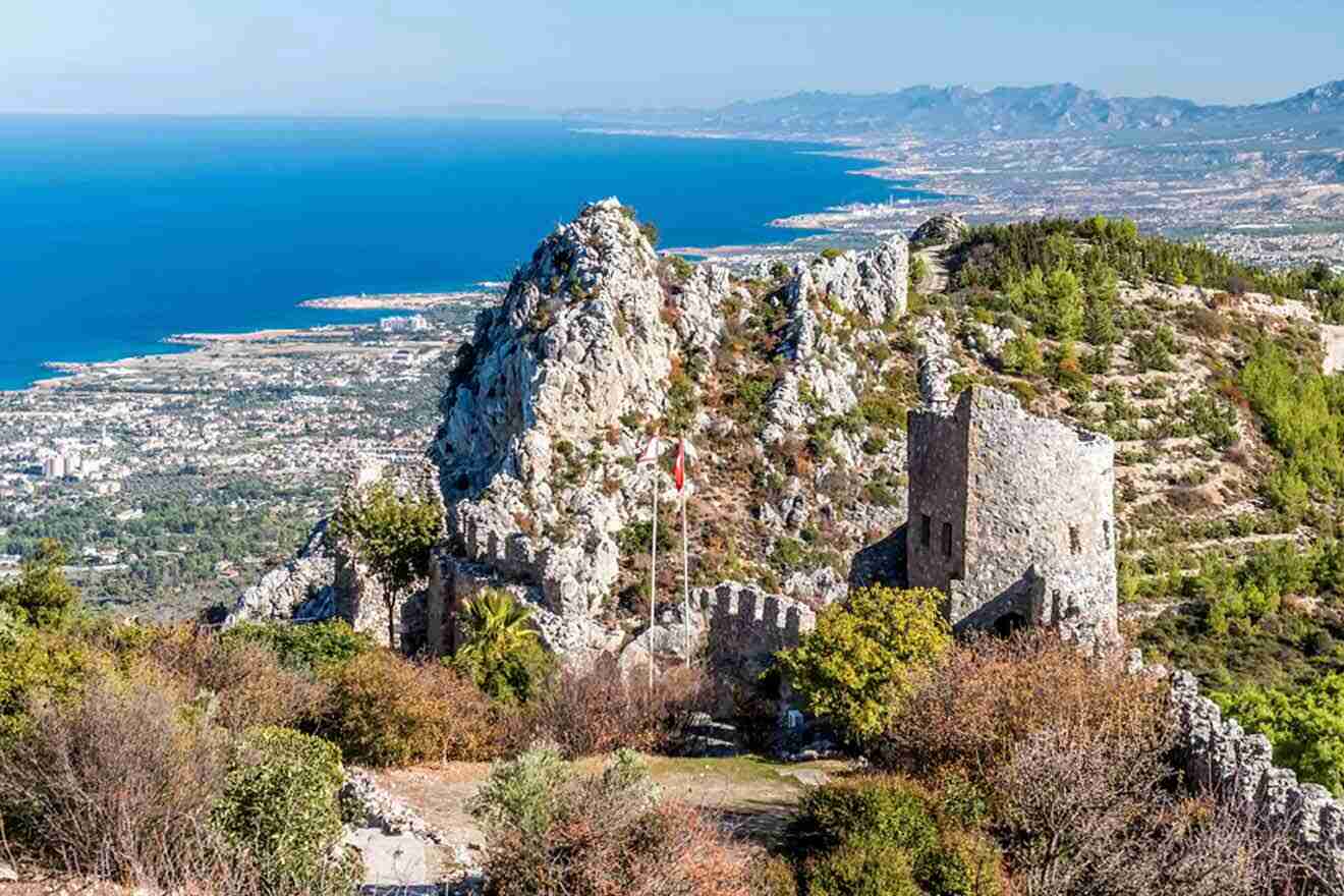 A view from the top of a mountain overlooking the sea.