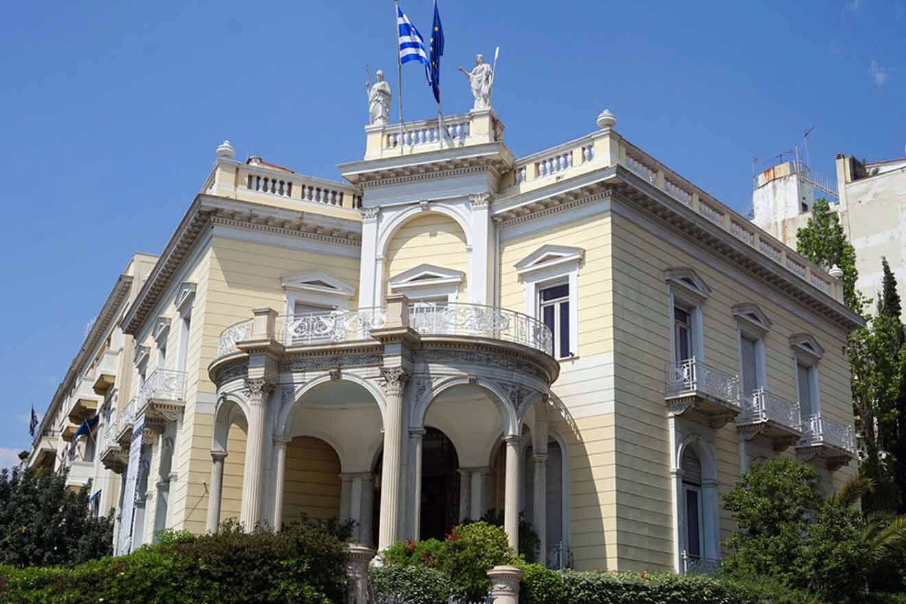 An ornate building with a flag on top.