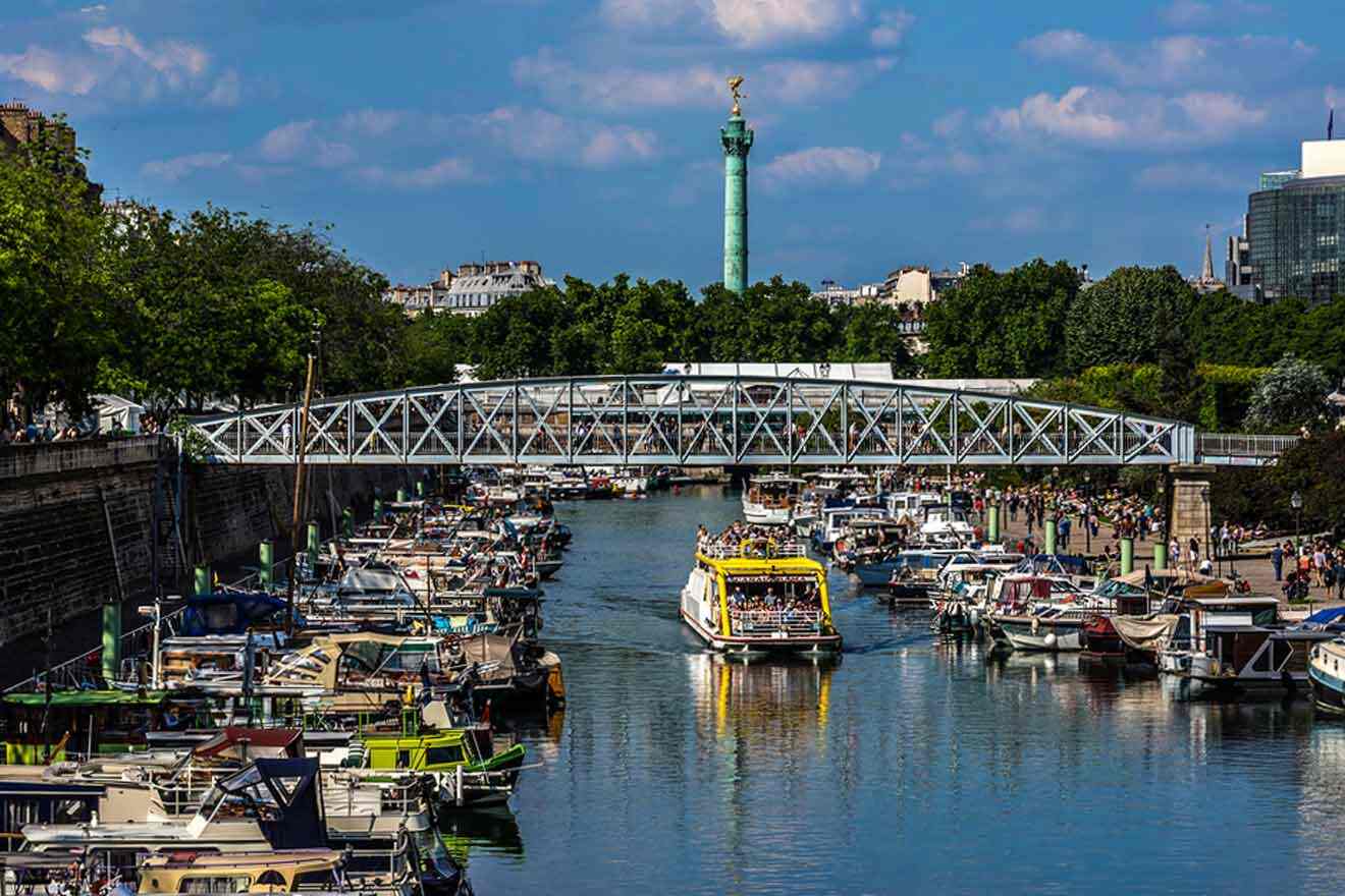 Boats are docked on a river.