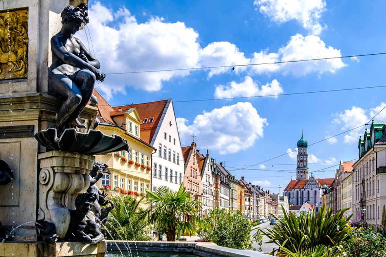 A fountain in the middle of a city.