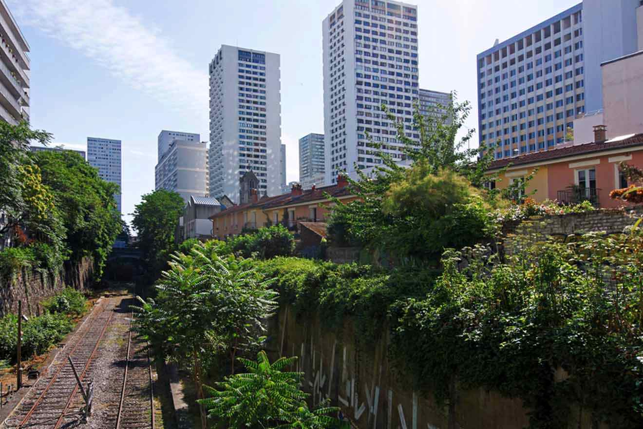 A train track in the middle of a city.