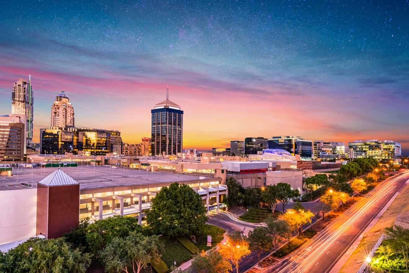 The skyline of a city at dusk.