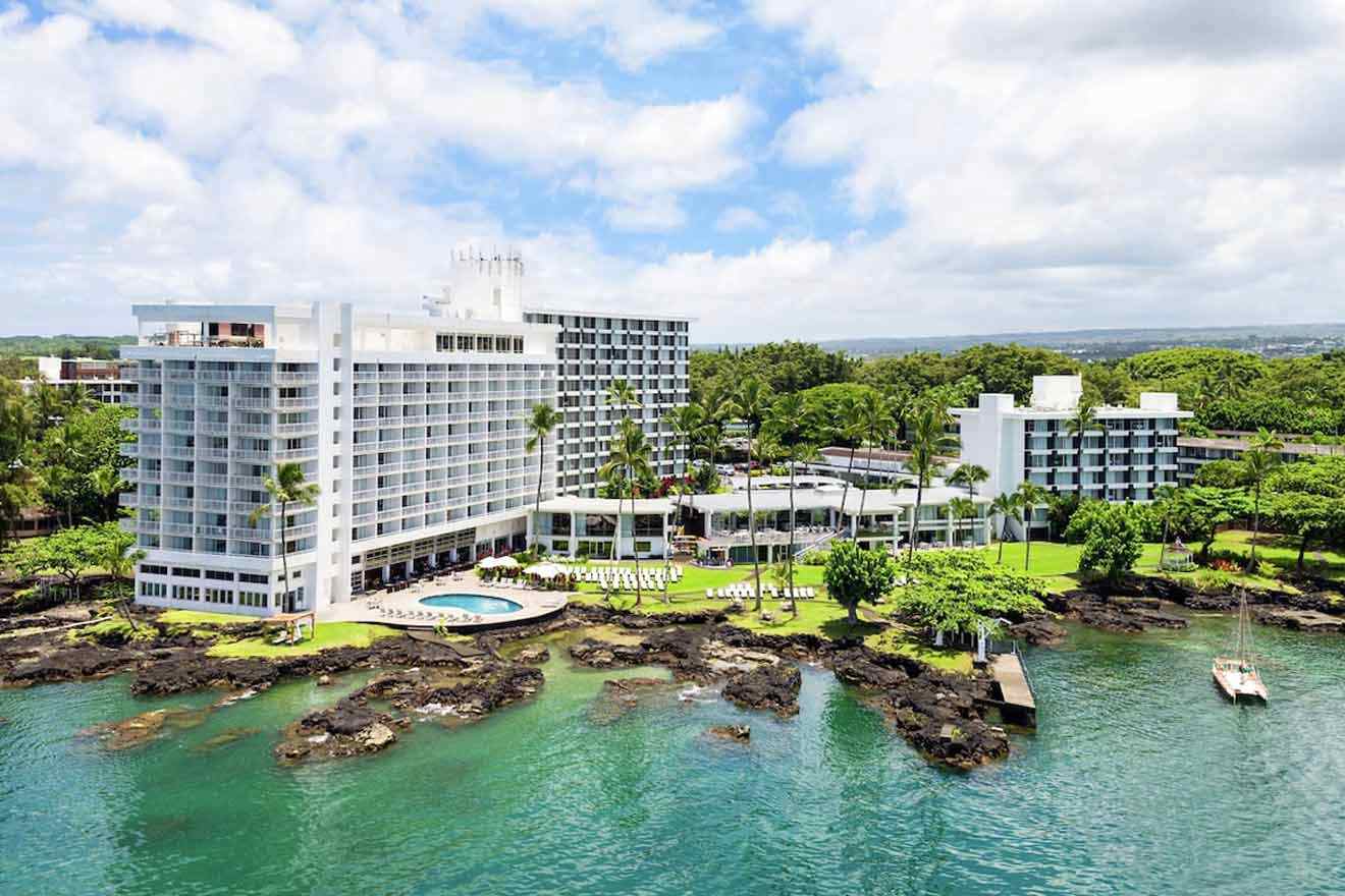 An aerial view of a hotel near the ocean.