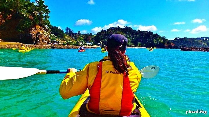 woman paddling a kayak