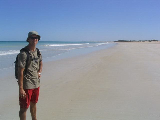 A man standing on a beach