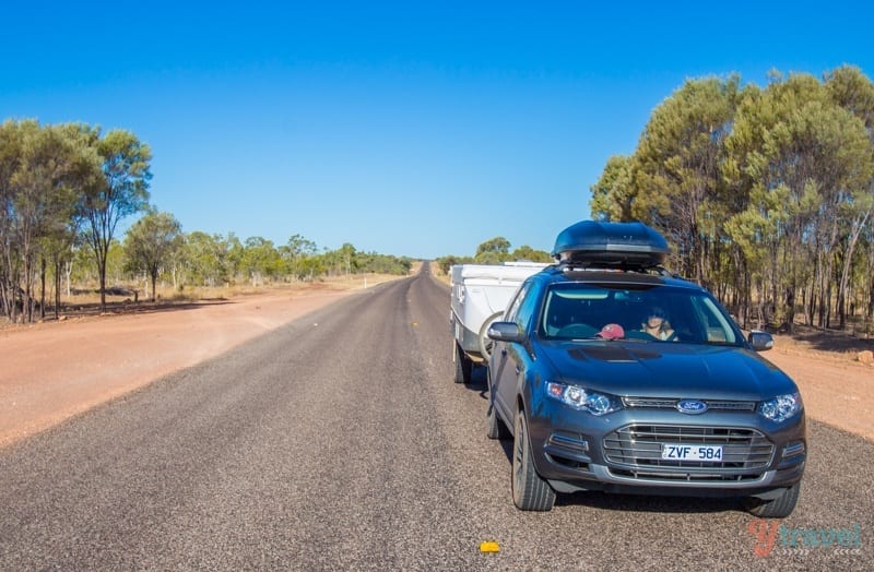 A car parked on the side of a road