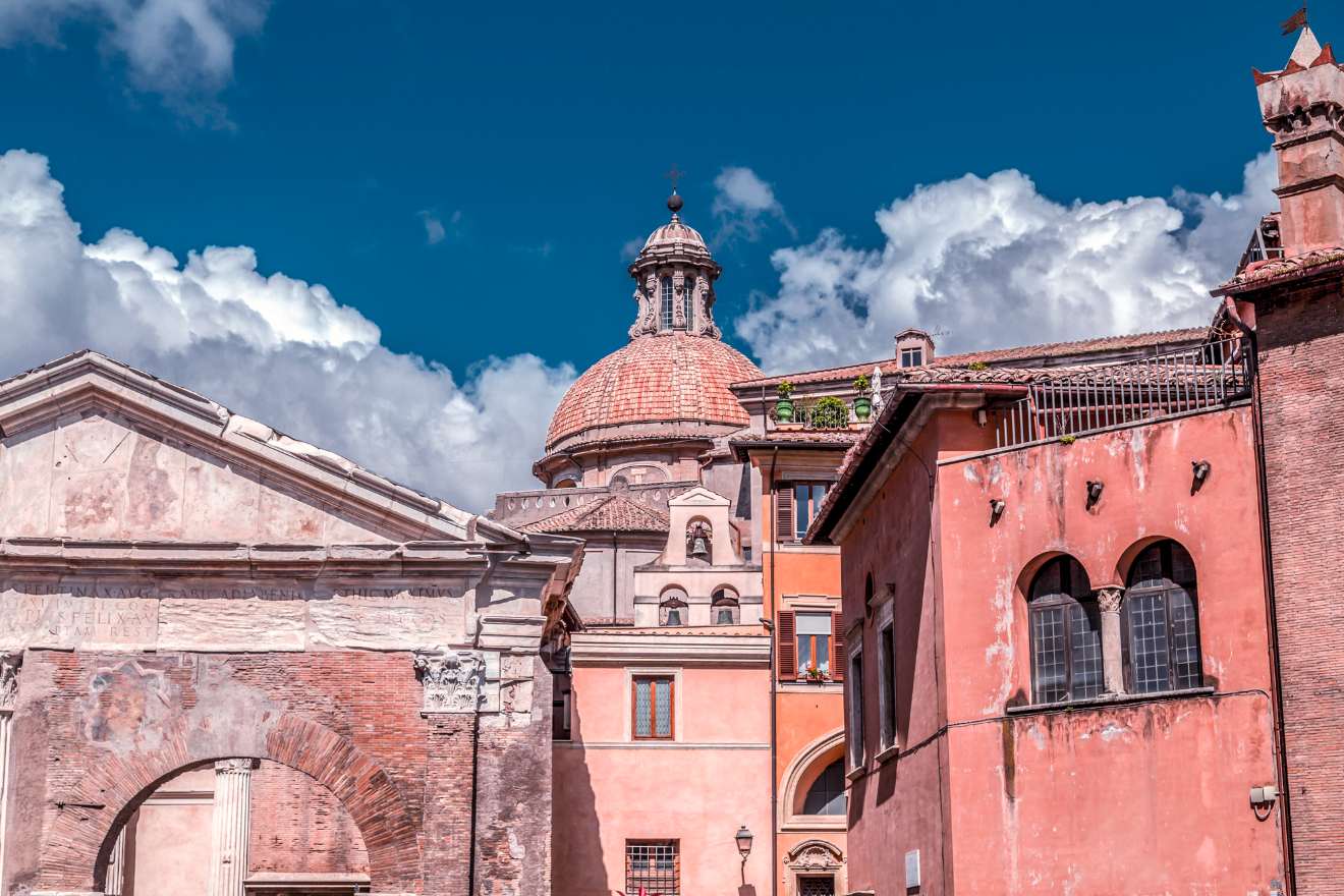 a group of buildings with a blue sky