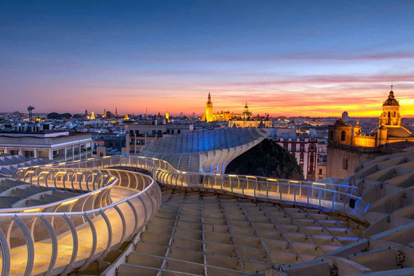 view of a city at sunset from the rooftops