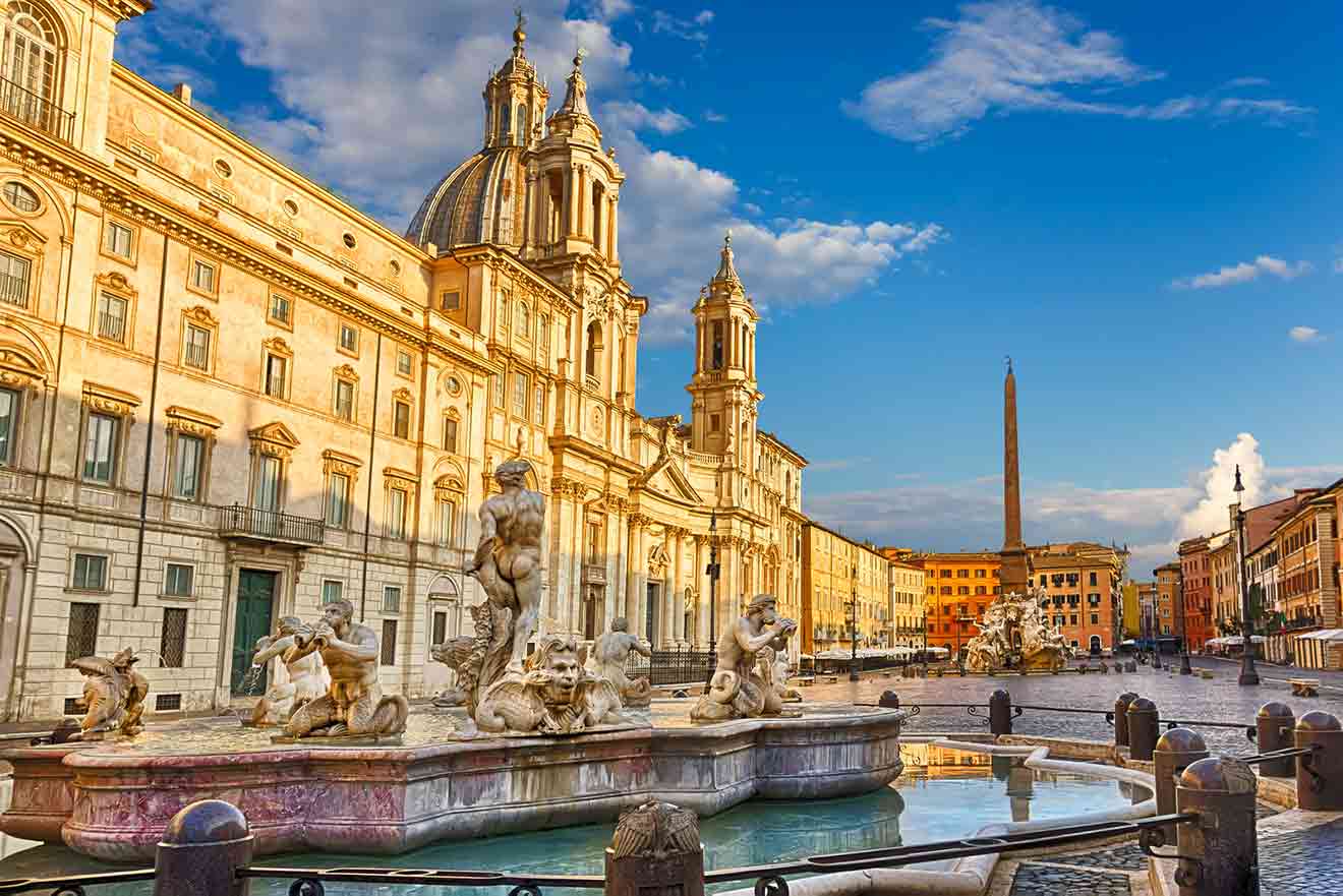 A fountain in the middle of a square in rome, italy.