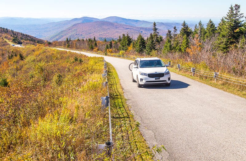 car on Skyline Drive Vermont during fall