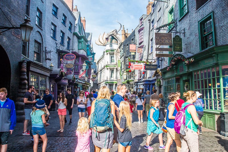 family walking through Diagon Alley at Universal Studios Orlando Attractions