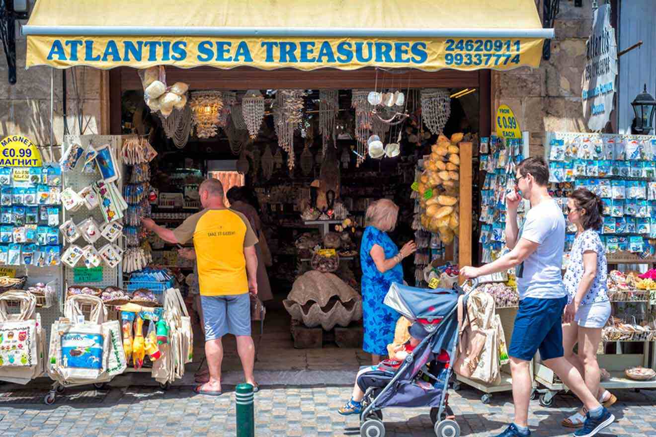 souvenirs shop with people walking by it in Larnaca