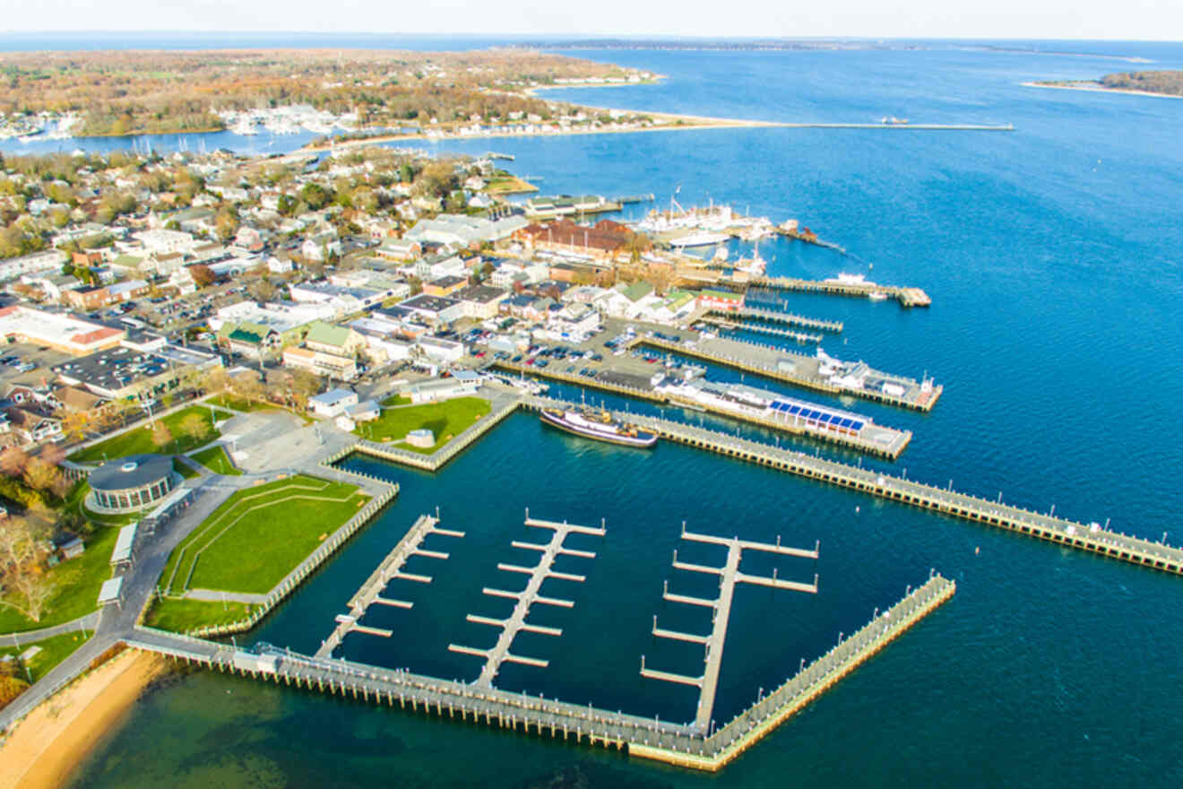 An aerial view of a marina with boats docked in it.