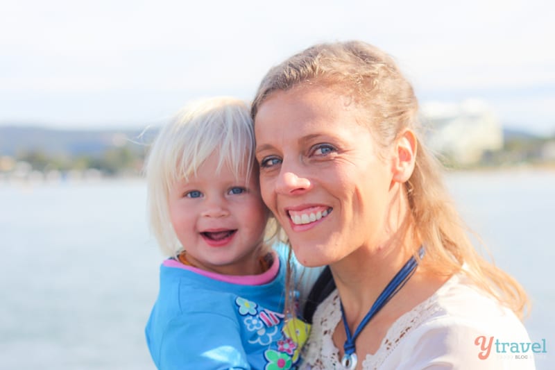 mum with toddler smiling