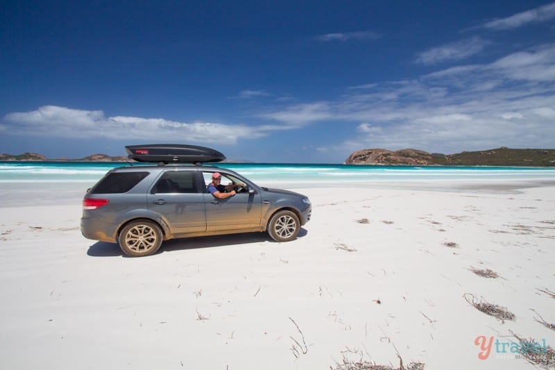 car on beach at Lucky Bay Beach, 