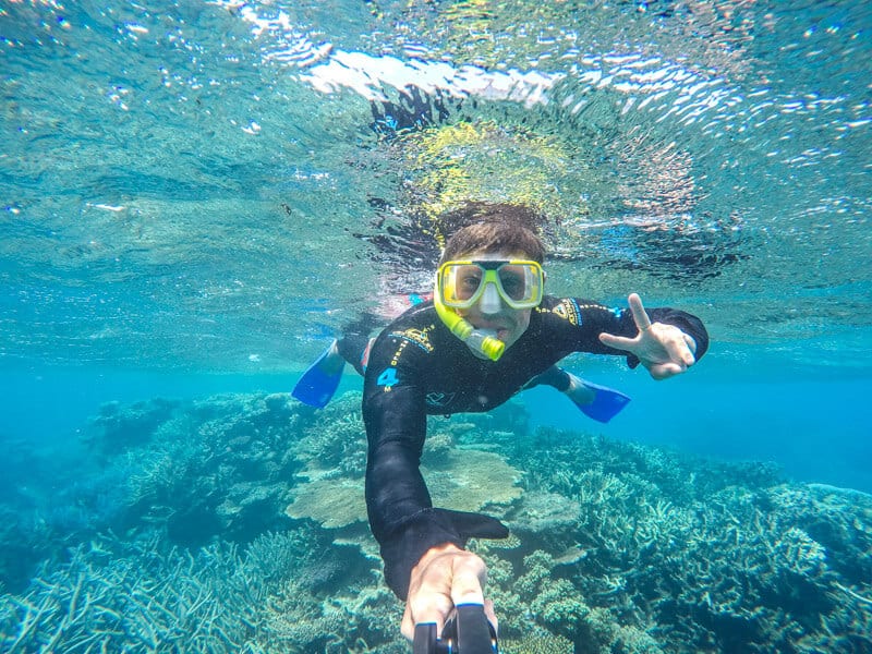 man Snorkeling at the Great Barrier Reef in Australia