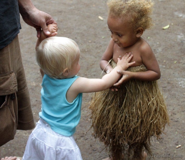 two babies embracing