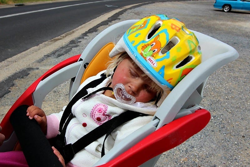 A child wearing a helmet