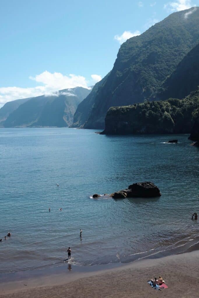 people swimming in Praia do Porto do Seixal