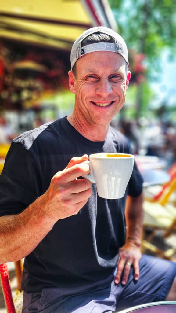 Man drinking mug of coffee