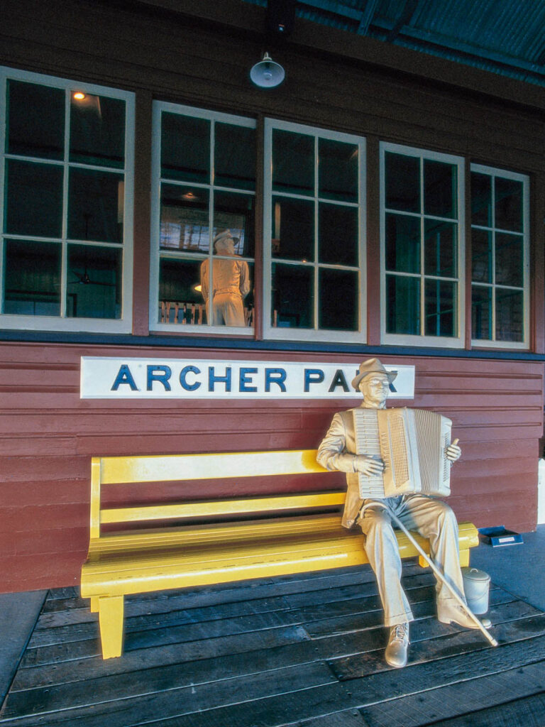 statue of man on chair