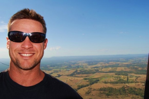 man posing in hot air balloon