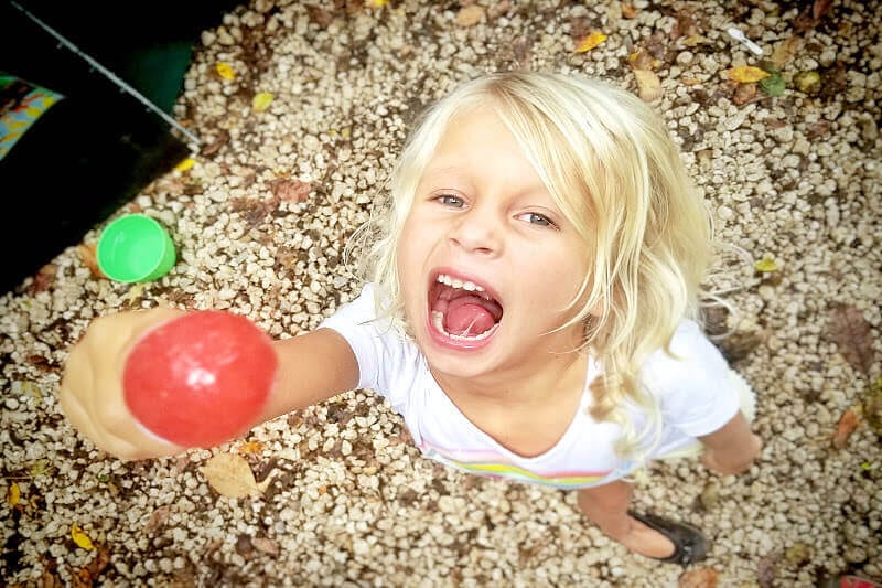 girl holding a lolipop