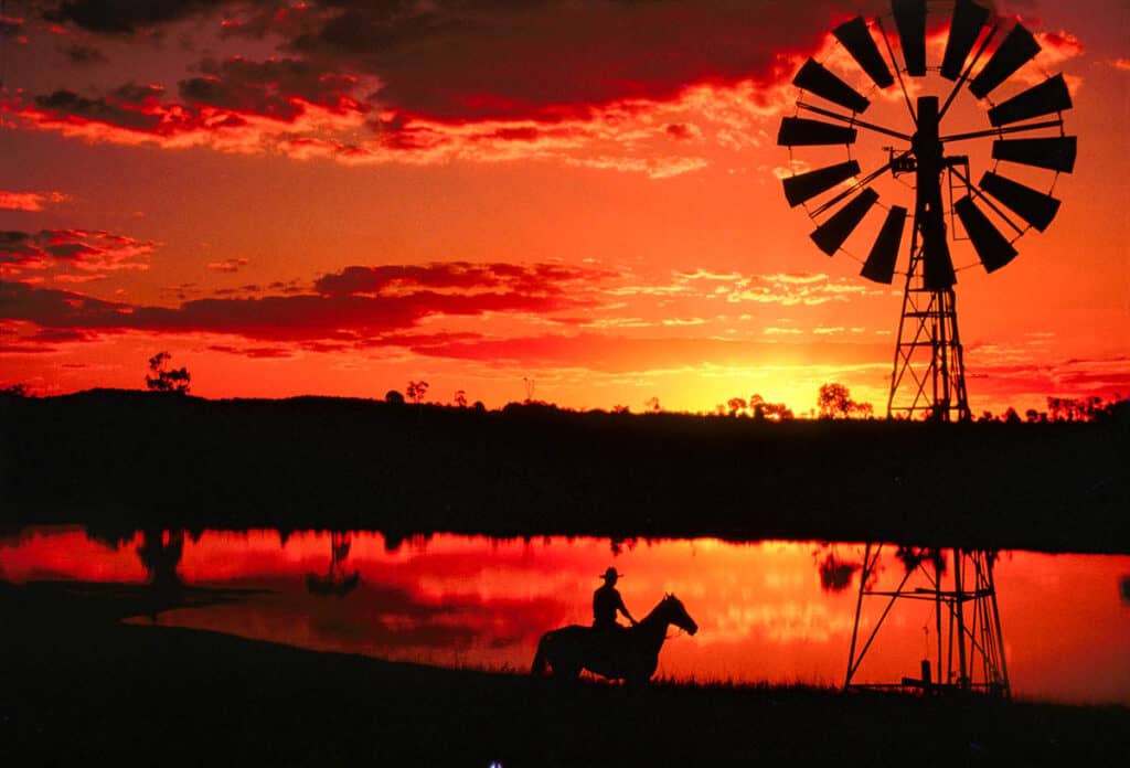 red Outback sunset over waterhole