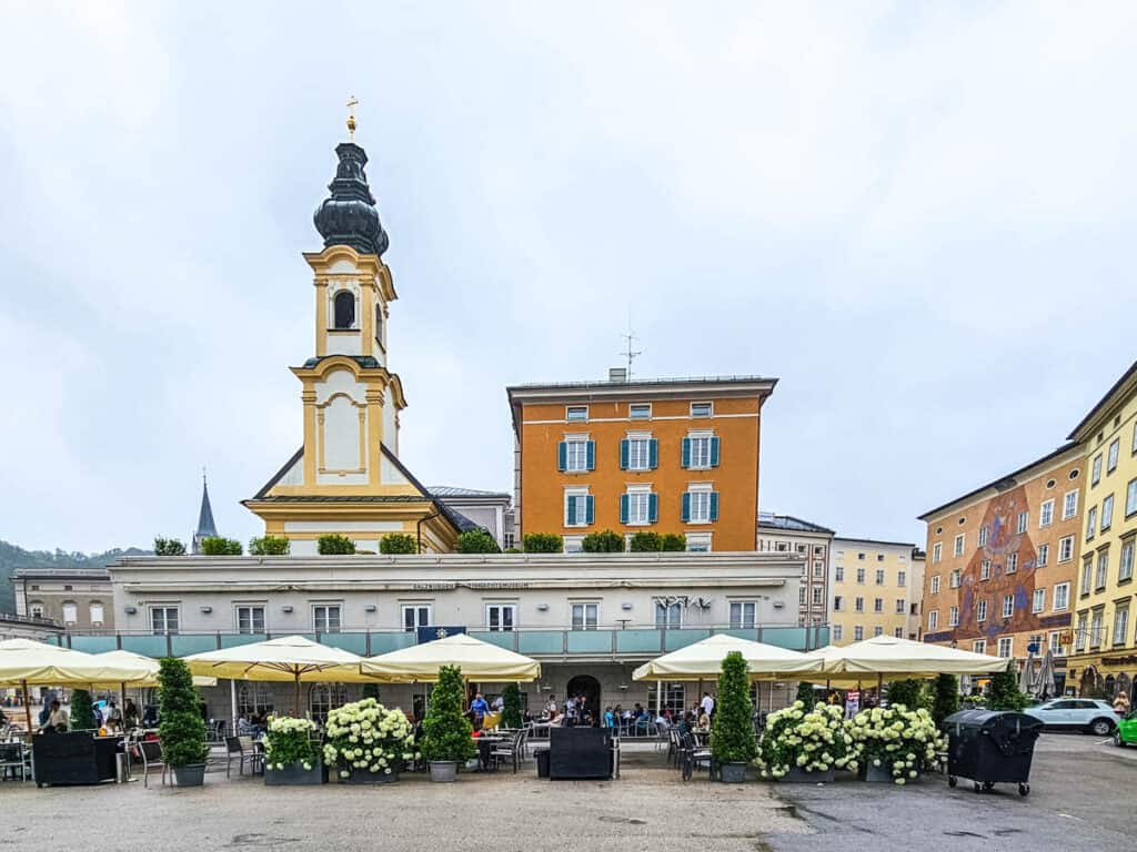 colorful buildings with al fresco dining area in square