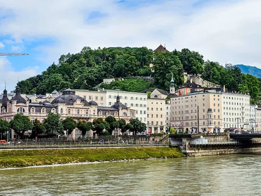 hilltop with buildings beside river