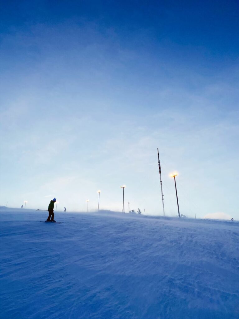 person cross country skiing