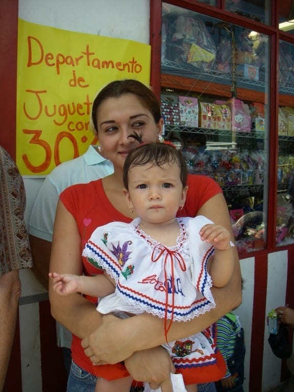 a woman holding a child