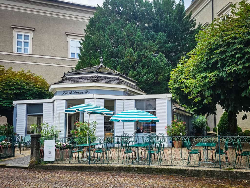 cafe with seating outside under shady trees