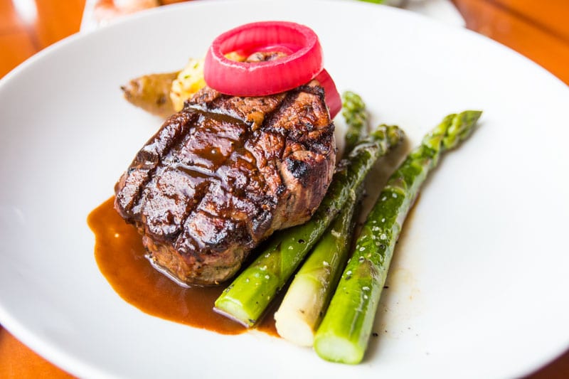 steak and asparagus on plate