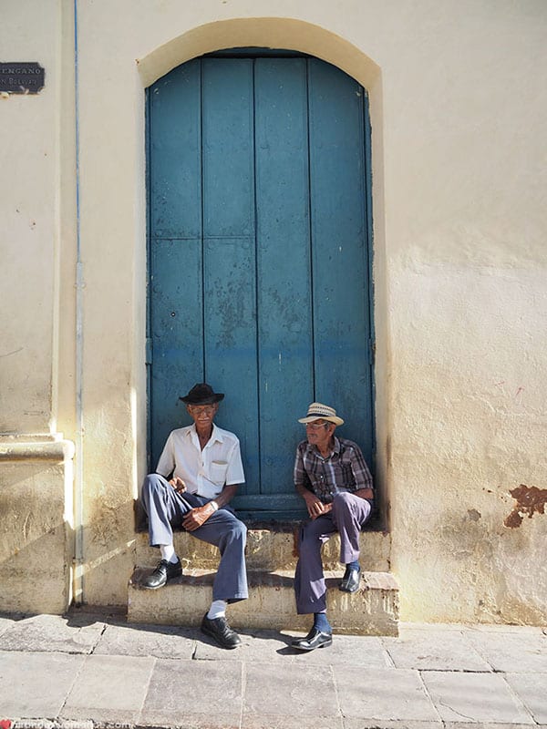 men sitting on steps