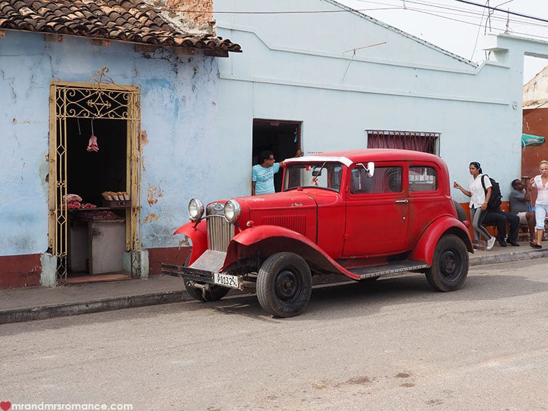 a car parked in front of a building