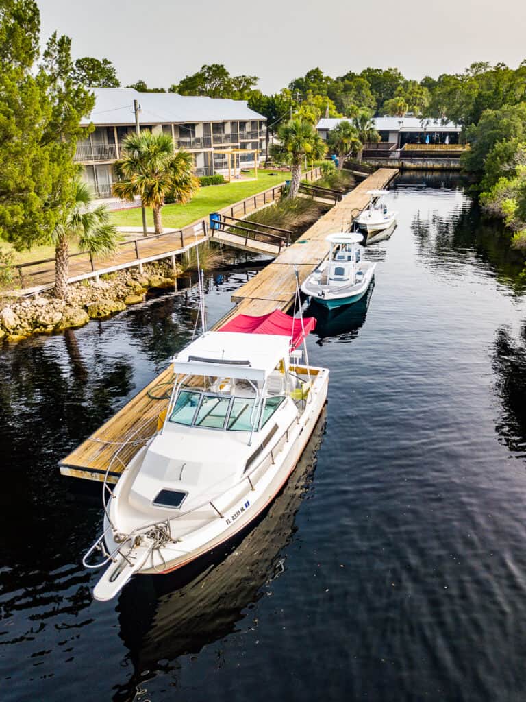 Boat docked on a river.