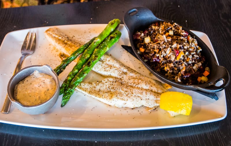 A plate of fish and rice