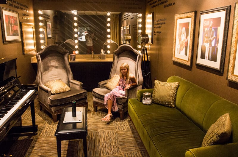 girl sitting in Dressing room backstage at the Grand Ole Opry in Nashville