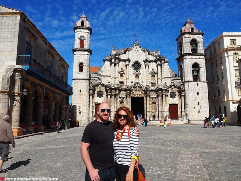 people standing in front of a cathedral