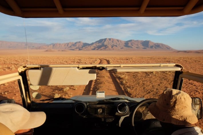 car driving on a dirt road