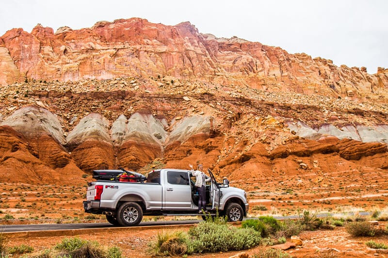 car on side of road looking at views in Capitol Reef NP