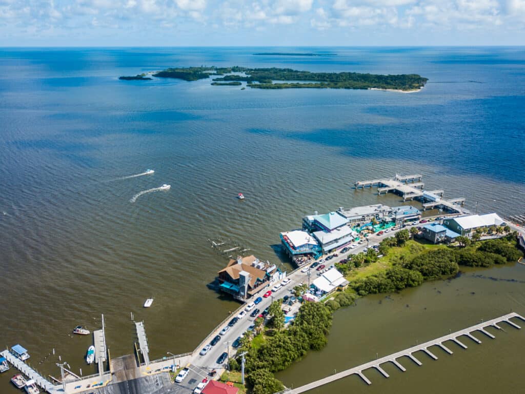 Aerial view of a fishing village and island called Cedar Key.